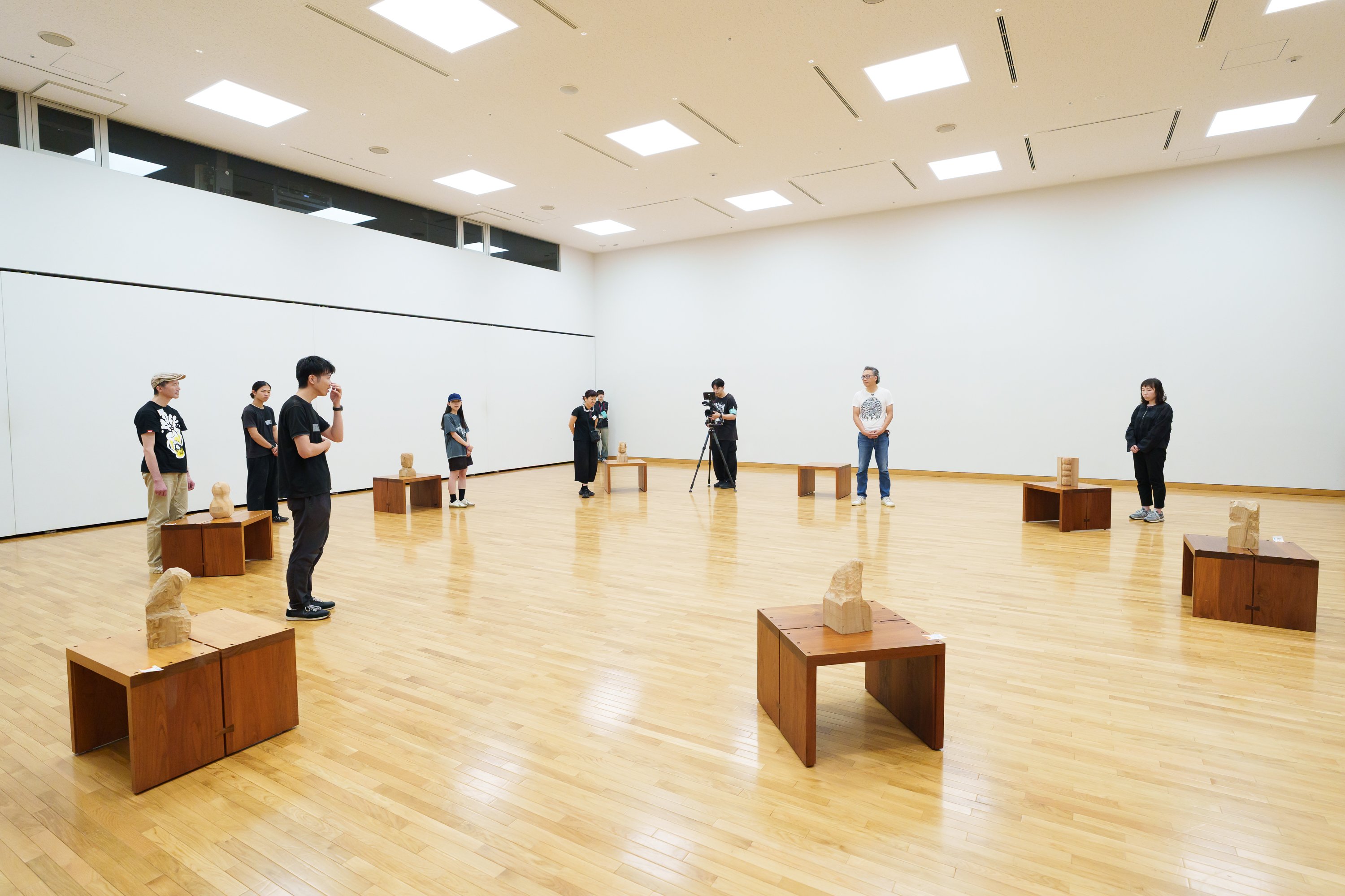 講堂に移動して作品発表